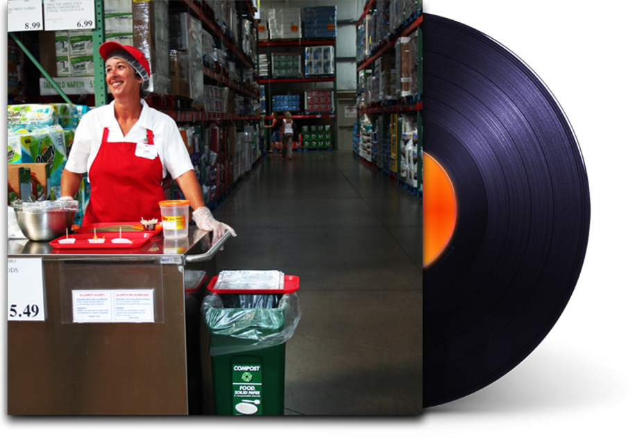 Demo album cover of Would You Like A Sample? features a woman giving out samples at Costco. Large artwork with vinyl record protruding from the side.